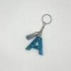 Porte clé lettre A bleu avec paillettes