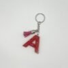 Porte clé lettre A rose avec paillettes