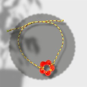 bracelet fleur rouge avec pépites dorées