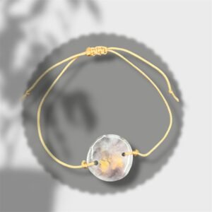 bracelet rond noir, blanc et jaune