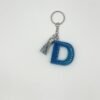 Porte clé lettre D bleu