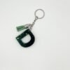 Porte clé lettre D vert