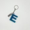 Porte clé lettre E bleu