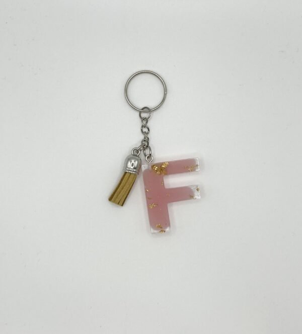 Porte clé lettre F rose avec paillettes dorées