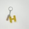 Porte clé lettre H jaune