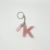 Porte clé lettre K rose avec paillettes dorées