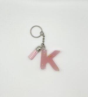 Porte clé lettre K rose avec paillettes dorées