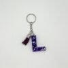 Porte clé lettre L bleu avec paillettes