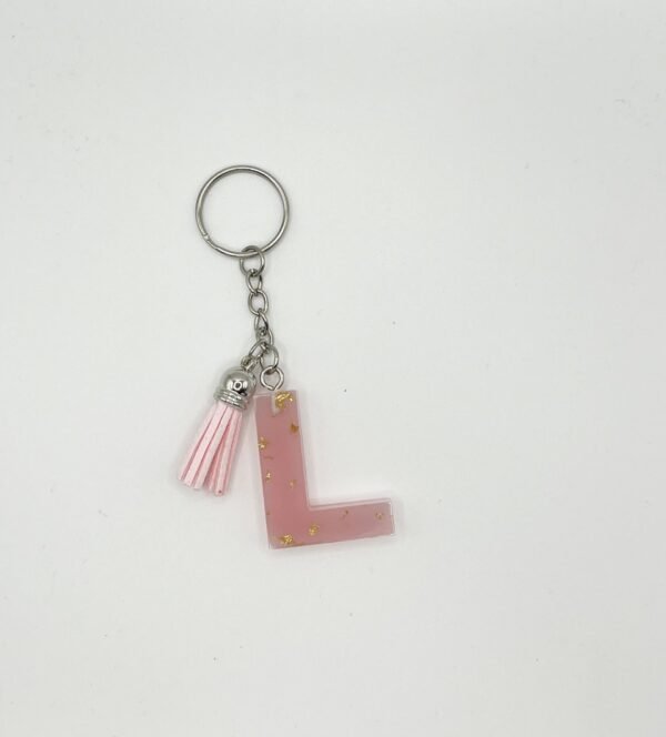 Porte clé lettre L rose avec paillettes dorées