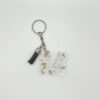 Porte clé lettre M transparent