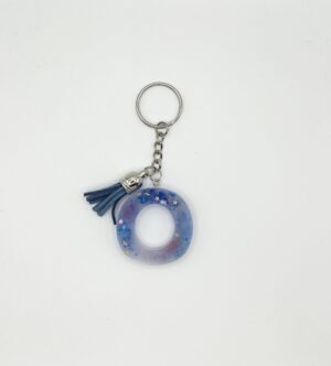 Porte clé lettre O bleu et blanc avec paillettes