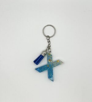 Porte clé lettre X bleu et blanc avec paillettes dorées